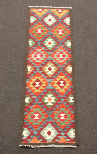 A red, brown and blue ground Maimana Kilim runner 203cm x 65cm  