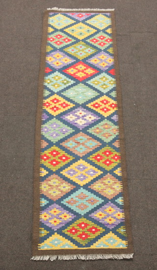 A blue, black and green ground Maimana Kilim runner with overall diamond design 210cm x 63cm  