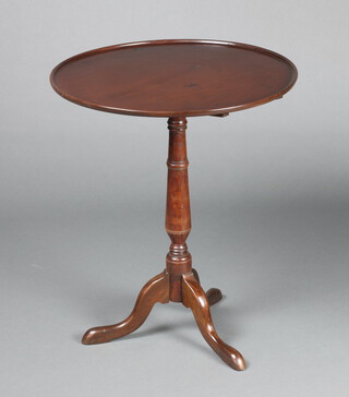 A  Georgian circular dish top wine table raised on pillar and tripod base 67cm h x 56cm diam.