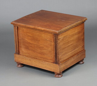 A Victorian rectangular mahogany commode with hinged lid and associated ceramic liner, raised on bun feet 41cm h x 50cm w x 43cm d  