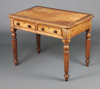 A Victorian rectangular mahogany writing table with inset writing surface, the based fitted 2 drawers with tore handles, raised on turned supports 68cm h x 91cm w x 60cm d 