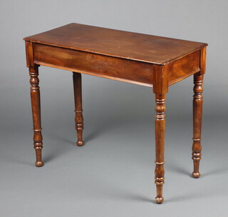 A Victorian rectangular mahogany side table raised on turned supports 76cm h x 81cm w x 44cm d 