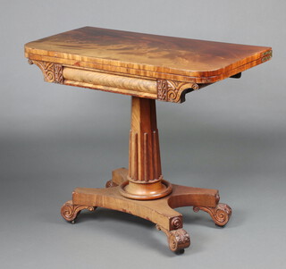 A William IV bleached mahogany pedestal card table raised on an octagonal column with fluted decoration and triform base 76cm h x 91cm w x 45cm d 