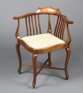 An Edwardian inlaid mahogany stick and rail back corner chair with upholstered seat, raised on cabriole supports and H framed stretcher 70cm h x 63cm w x 56cm d 