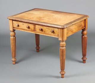 A Victorian mahogany writing table with inset brown writing surface, the base fitted 2 drawers, raised on turned turned and fluted supports 68cm h x 91cm w x 66cm d 