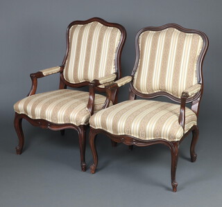 A pair of French style mahogany show frame open arm chairs, the seats and backs upholstered in yellow Regency stripe, raised on cabriole supports 104cm h x 69cm w x 56cm d 