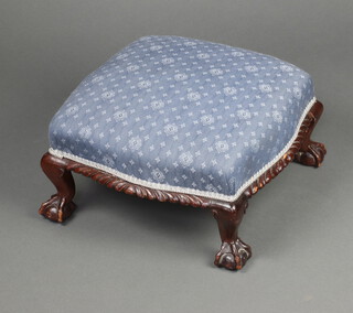 A Georgian style square mahogany show frame footstool, upholstered in blue material, raised on carved cabriole ball and claw supports 19cm h x 38cm w x 38cm d 