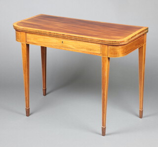 A Georgian cross banded mahogany card table fitted a frieze drawer, raised on square tapered supports 73cm h x 97cm w x 47cm d 