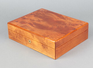 A rectangular figured walnut wristwatch box, the plush interior fitted 10 compartments with hinged lid 8cm x 28cm x 22cm d 