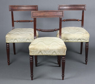 A set of 3 19th Century mahogany bar back dining chairs with rope turned mid rails and overstuffed seats raised on turned supports 83cm h x 46m w x 44cm d  