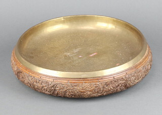 A circular Kashmir carved hardwood bowl with gilt metal liner 8cm x 31cm 