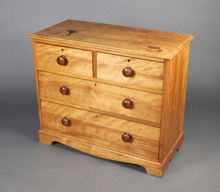 A Victorian bleached mahogany chest of 2 short and 2 long drawers with turned handles 88cm h x 95cm w x 46cm d 