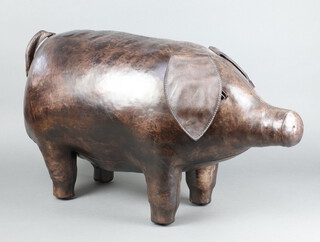 Omersa, a leather covered footstool in the form of a standing pig 43cm h x 72cm w x 29cm d 