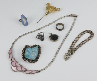 A silver bracelet and minor silver jewellery