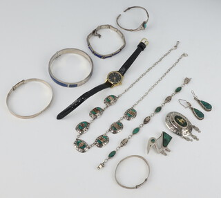 A silver bangle and minor silver mounted jewellery