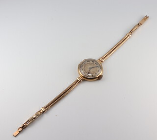 A lady's 9ct yellow gold wristwatch and bracelet, gross weight including movement and broken glass 19 grams 