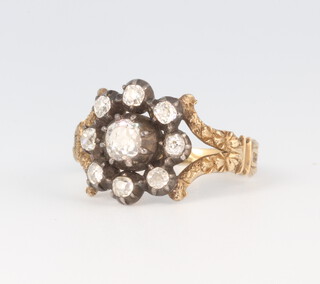 A 19th Century yellow metal 9 stone diamond cluster ring, 2.9 grams, approx. 0.5ct 