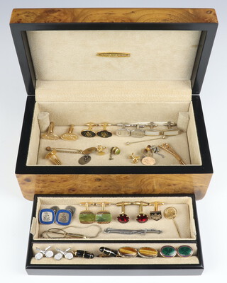 A walnut jewellery box containing a quantity of silver and other cufflinks 