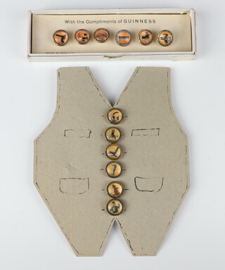 Two sets of Guinness waistcoat buttons 