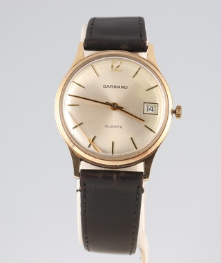 A gentleman's 9ct yellow gold Garrard quartz wristwatch 32mm 