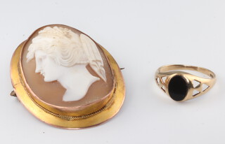 A yellow metal 9ct mounted cameo portrait brooch 40mm, together with a 9ct gold signet ring size K 1/2, gross weight 11.8 grams 