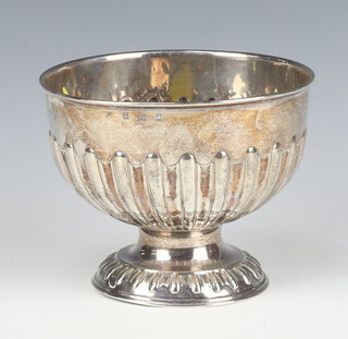 A Victorian repousse silver rose bowl 11.5cm 160 grams together with a miniature silver scent 