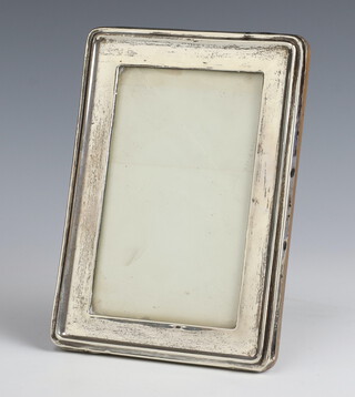 A rectangular silver photograph frame Birmingham 1913, 17.5cm x 15.5cm 