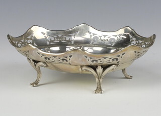 An Edwardian silver octagonal shaped nut dish with pierced decoration on scroll feet, Birmingham 1902, 14cm, 90 grams 