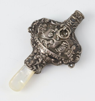 An Edwardian repousse silver rattle and whistle teether with mother of pearl mount Birmingham 1905, 7cm 