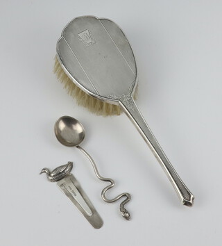 A silver mounted hair brush, book mark and spoon