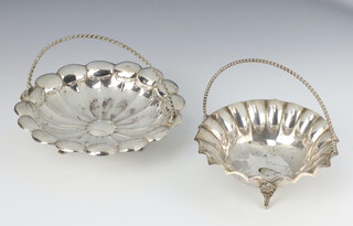 A white metal repousse dish with twist handle 11cm, a ditto 14cm, 187 grams 