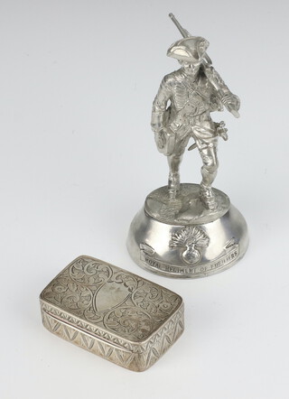 A silver rectangular pill/snuff box with engraved decoration Birmingham 1924 41 grams, together with a plated figure of a soldier 