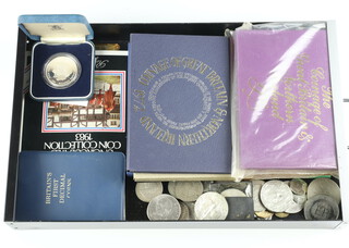 Nine Great Britain and Northern Ireland proof coin sets 1972,73,74,75,76, 80,80,81 and 1982 together with a silver commemorative crown and minor coins  