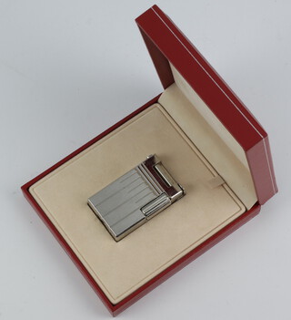 A gentleman's Dupont Perspective 2000 cigarette lighter contained in original box  