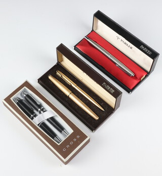 A Parker gold plated fountain pen and ballpoint pen boxed, a steel cased Parker fountain pen together with a cased Cross ballpoint pen and propelling pencil 