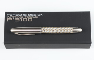 A Porsche Design P3100 brushed steel ballpoint pen with 2 colour body, boxed  