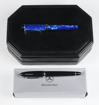 A Laban blue marbled and steel fountain pen with Oridium nib boxed and a Mercedes Benz black and steel fountain pen with white metal nib boxed