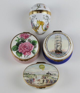 A Crummles egg shaped enamelled box decorated with birds 6cm, an oval ditto Pioneers of Flight by Hot Air Balloon no.164 6cm, ditto Sir Lancelot no.170 and a Royal Worcester Queen Elizabeth Rose, all boxed