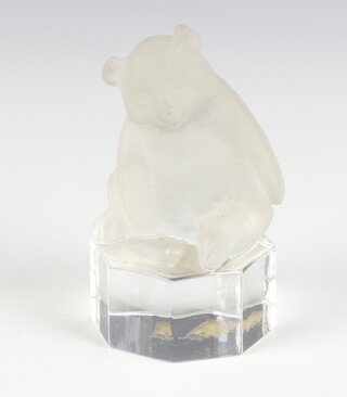 A Goebel frosted glass figure of a bear sitting on an octagonal clear glass base, etched Goebel 1987, 9.5cm 