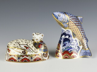 A Royal Crown Derby Imari pattern  paperweight - lion cub no.371 of 1500 13cm and leaping salmon 15cm, both boxed and both with gold stoppers 