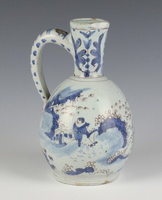 A 19th Century Delft jug decorated with figures in landscapes 19cm 