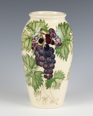 A contemporary Moorcroft Collector's Club vase, the cream ground decorated with grapes 18cm 