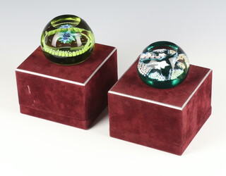 Two Edinburgh Crystal paperweights Emerald Star no.80 of 100 7cm and Aquamarine no.23 of 250 7cm, boxed