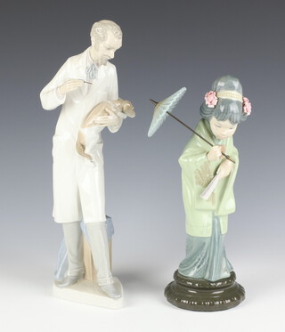 A Lladro figure of a Japanese lady 28cm, ditto of a Vet 30cm 