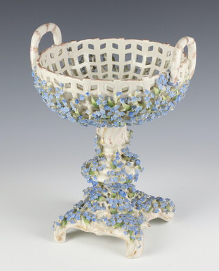 A 19th Century  Continental  tazza with applied flowers and pierced decoration 26cm 
