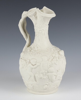 A Victorian Copeland parian jug decorated with a bacchanalian scene 26cm 