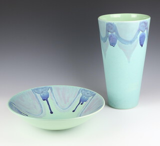 A modern Poole Pottery Carousel shallow bowl with slip glazed decoration on a turquoise ground 33cm, ditto vase 35cm 