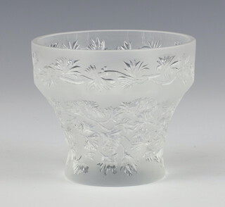 A modern Lalique frosted and moulded glass tea light holder decorated with flowers, engraved lower case marks 8cm 