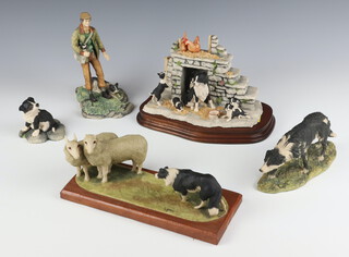 A Border Fine Arts figure of a shepherd and sheep dog 1982 17cm, ditto of a sheep dog by M Lang 1979 15cm, ditto sheep dog puppy 1987 8cm, a group of sheep dogs before a fire place 18cm and a similar group dog of a sheep dog and sheep a/f 20cm 