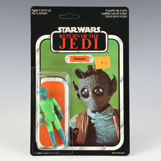 Star Wars by Palitoy, a Greedo action figure on hybrid logo 70 back Return of the Jedi unpunched card ROTJ 70A ( Hong Kong 1983  )